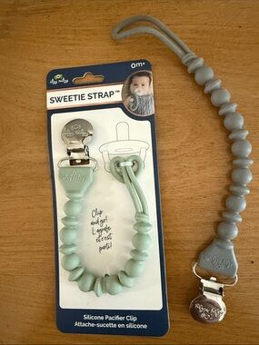 Set of two never used pacifier clips